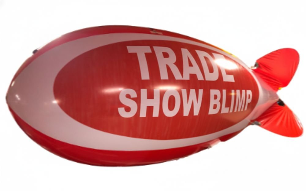 Indoor trade show advertising polyurethane blimps floating above booth height